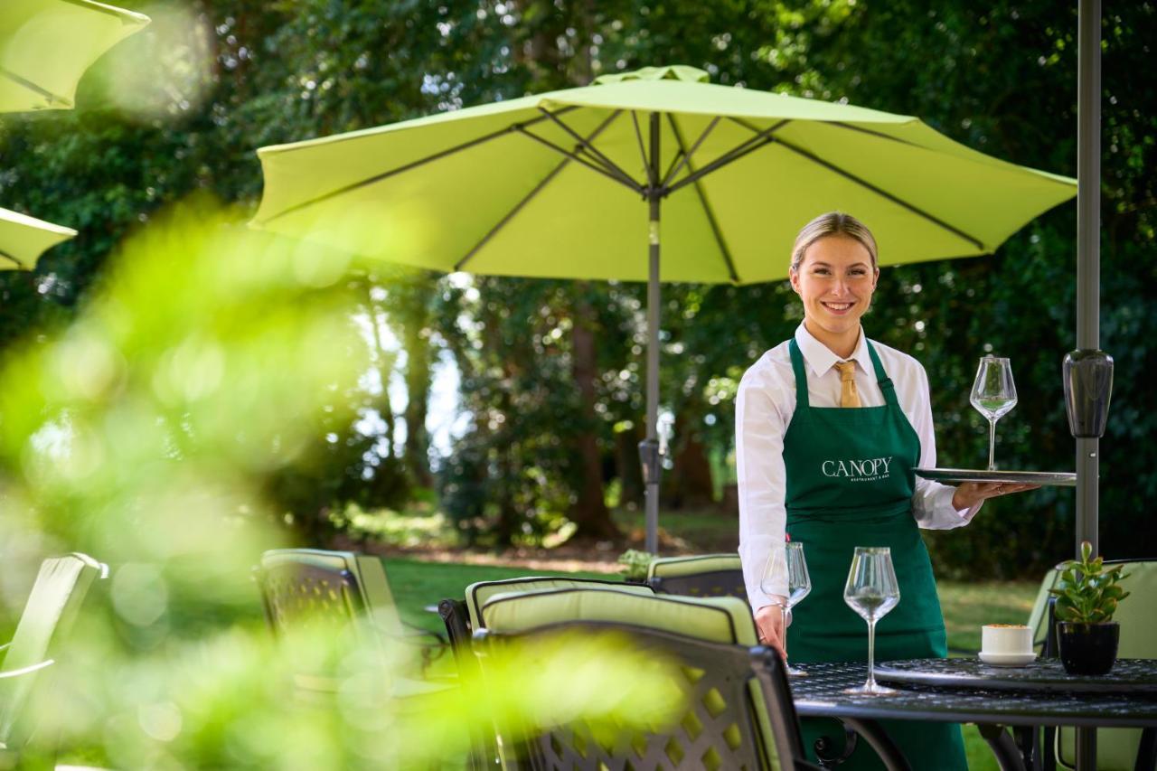 Castlemartyr Resort Hotel Экстерьер фото A waitress at work