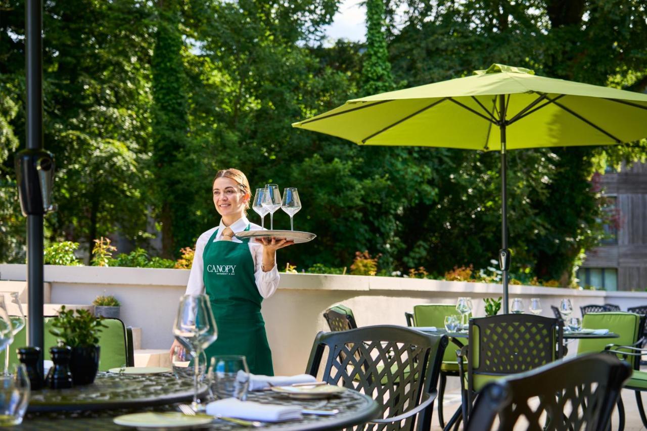 Castlemartyr Resort Hotel Экстерьер фото A waitress at the hotel